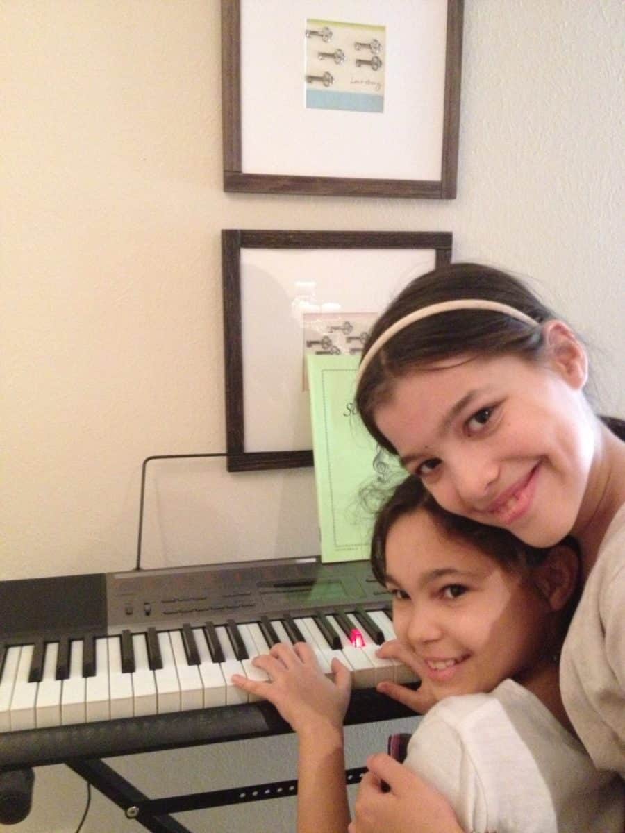 Positive Kids Playing Piano Keyboard - Stress-free piano lessons