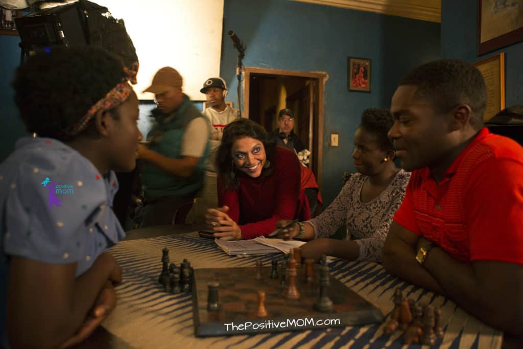 Queen Of Katwe Director Mira Nair with actors filming a chess scene 