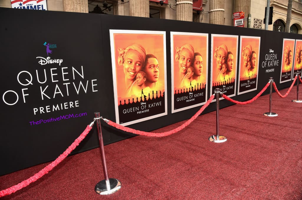 Queen Of Katwe red carpet - maroon carpet on Hollywood Boulevard