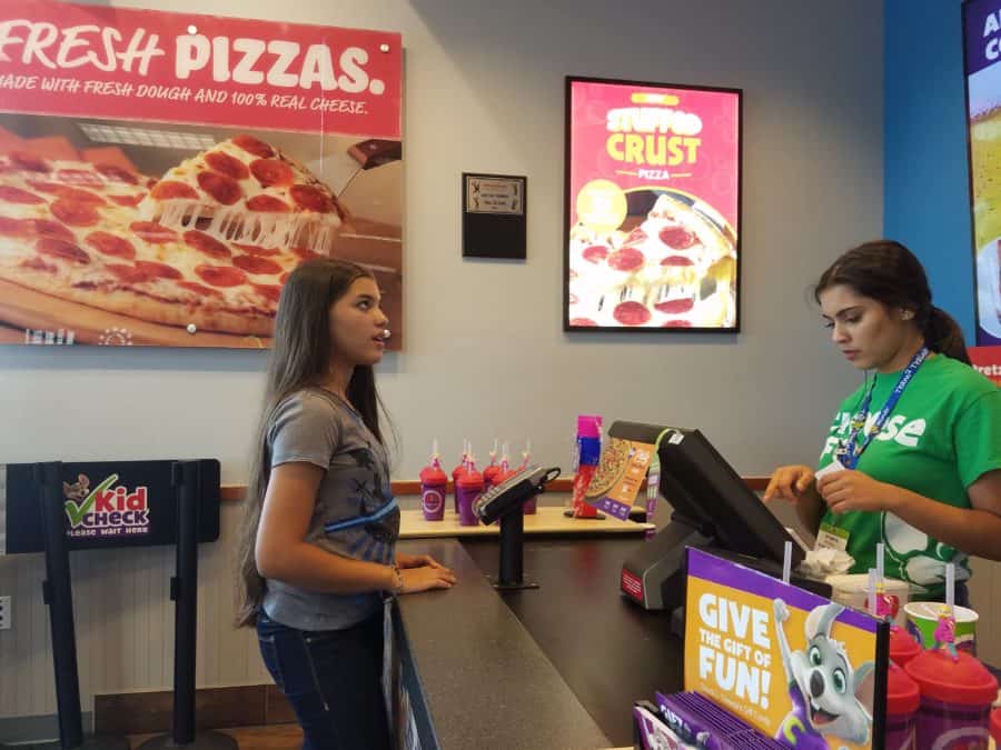 Chuck E Cheeses buying food 