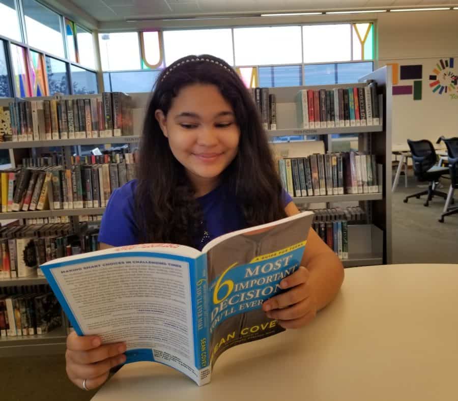 Drug free teen Elyssa reading book - Pursue greatness
