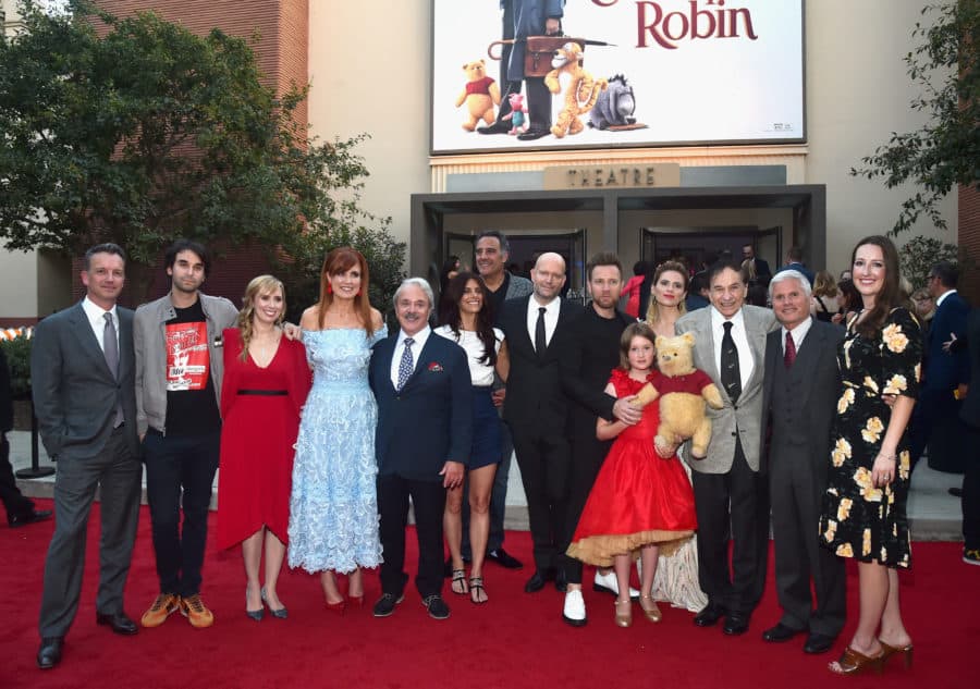 BURBANK, CA - JULY 30: (L-R) President of Walt Disney Studios Motion Picture Production, Sean Bailey, screenwriters Alex Ross Perry, Allison Schroeder, producer Kristin Burr, actor Jim Cummings, executive producer Renee Wolfe, actor Brad Garrett, director Marc Forster, actors Ewan McGregor, Bronte Carmichael, Hayley Atwell, songwriter Richard M. Sherman, producer Brigham Taylor and VP production at Walt Disney Pictures, Jessica Virtue attend the world premiere of Disney's 'Christopher Robin' at the Main Theater on the Walt Disney Studios lot in Burbank, CA on July 30, 2018. (Photo by Alberto E. Rodriguez/Getty Images for Disney) *** Local Caption *** Sean Bailey; Alex Ross Perry; Allison Schroeder; Kristin Burr; Jim Cummings; Renee Wolfe; Brad Garrett; Marc Forster; Ewan McGregor; Bronte Carmichael; Hayley Atwell; Richard M. Sherman; Brigham Taylor; Jessica Virtue