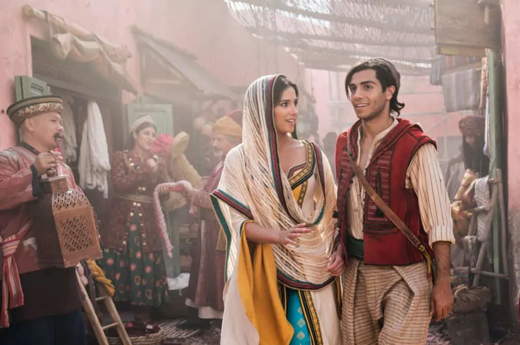 Naomi Scott as Jasmine and Mena Massoud as Aladdin in Disney’s live-action adaptation of ALADDIN, directed by Guy Ritchie.