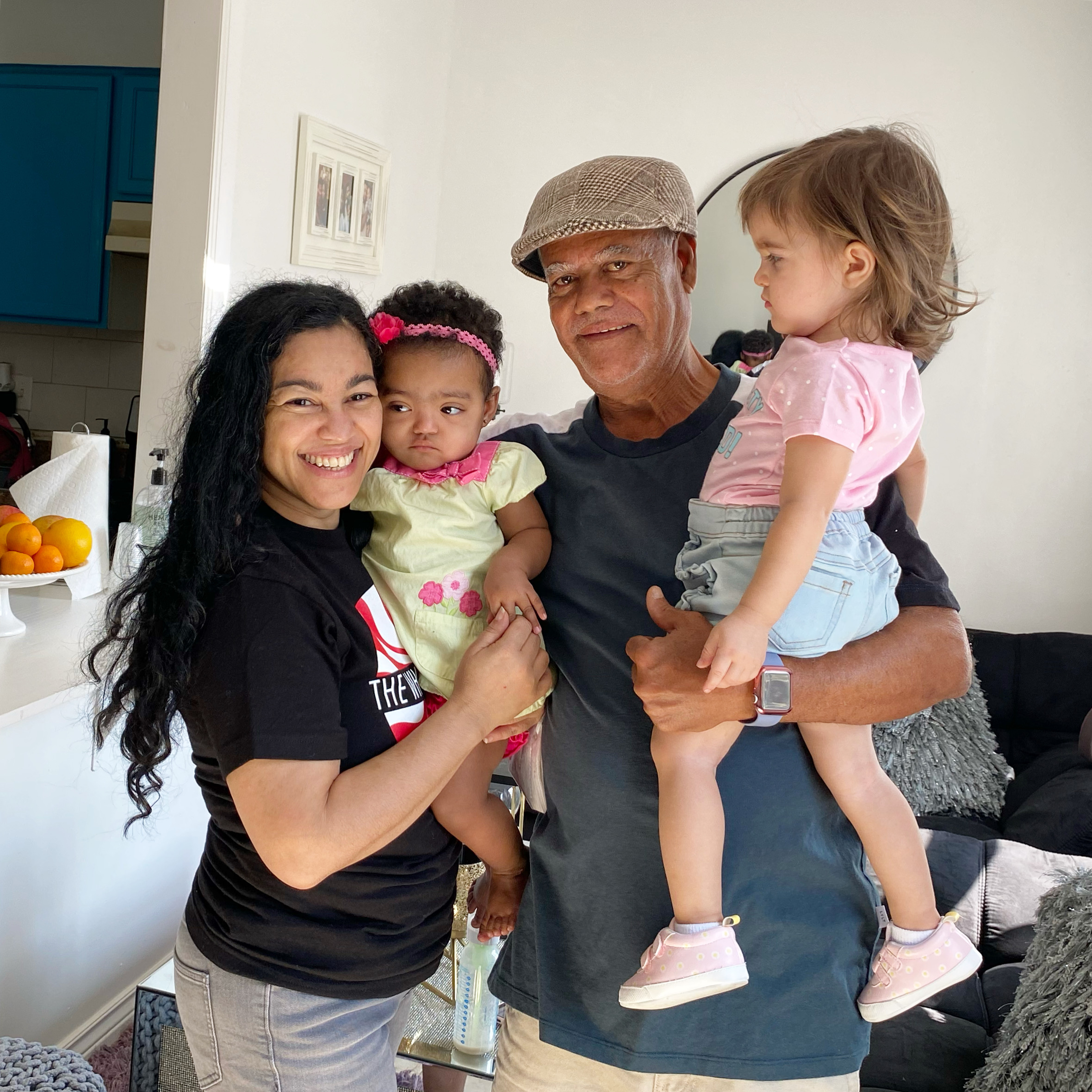 Grandpa meets two new granddaughters